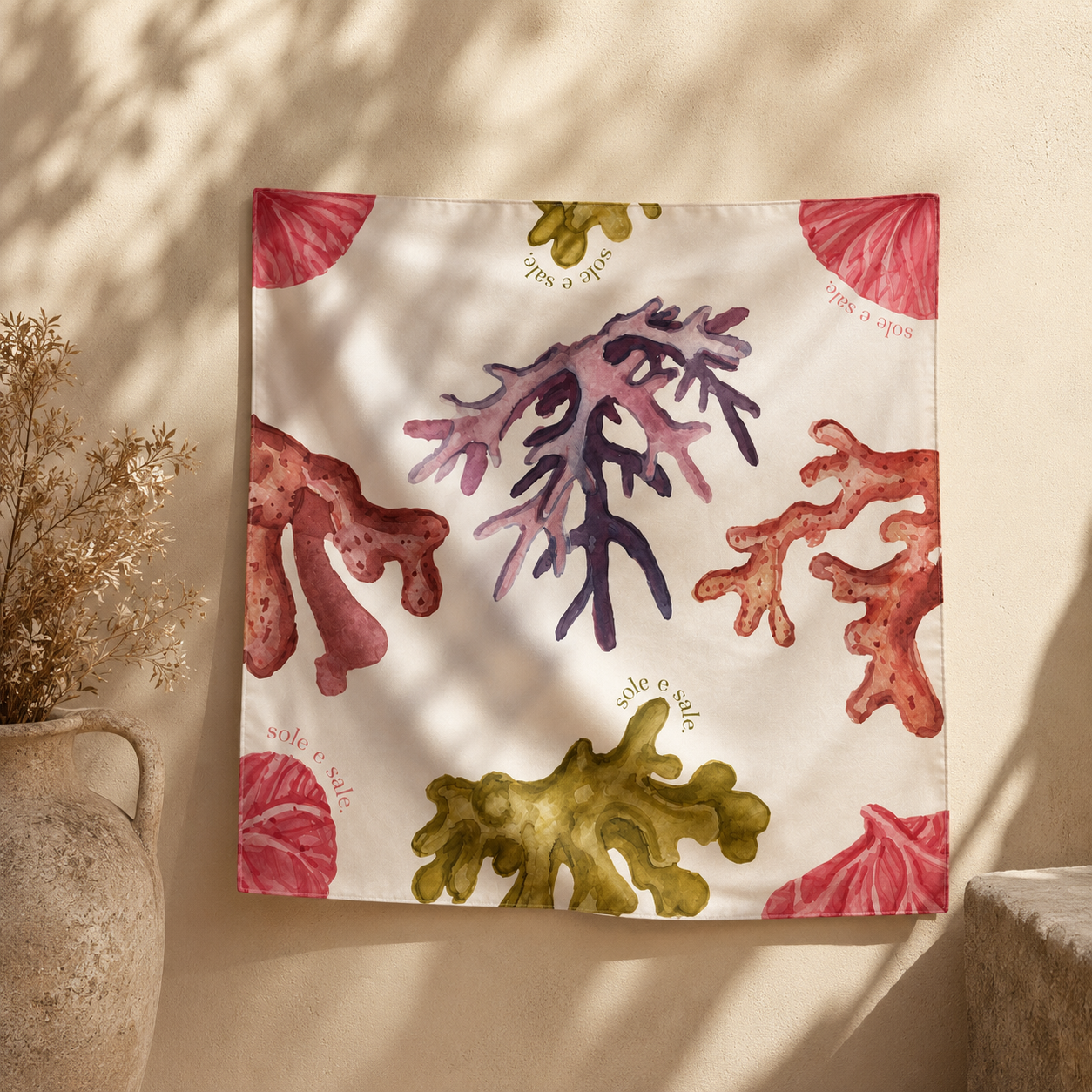 Decorative towel with seaweed pattern on a neutral background